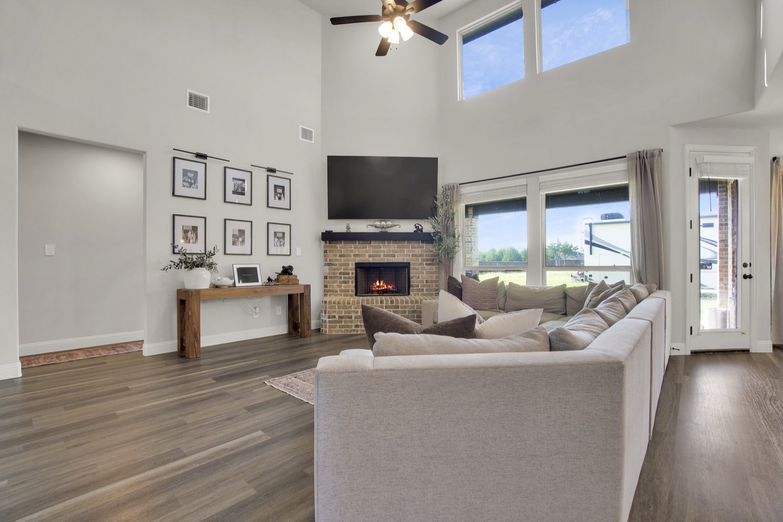 Living room with vaulted ceiling and fireplace, Ellis County