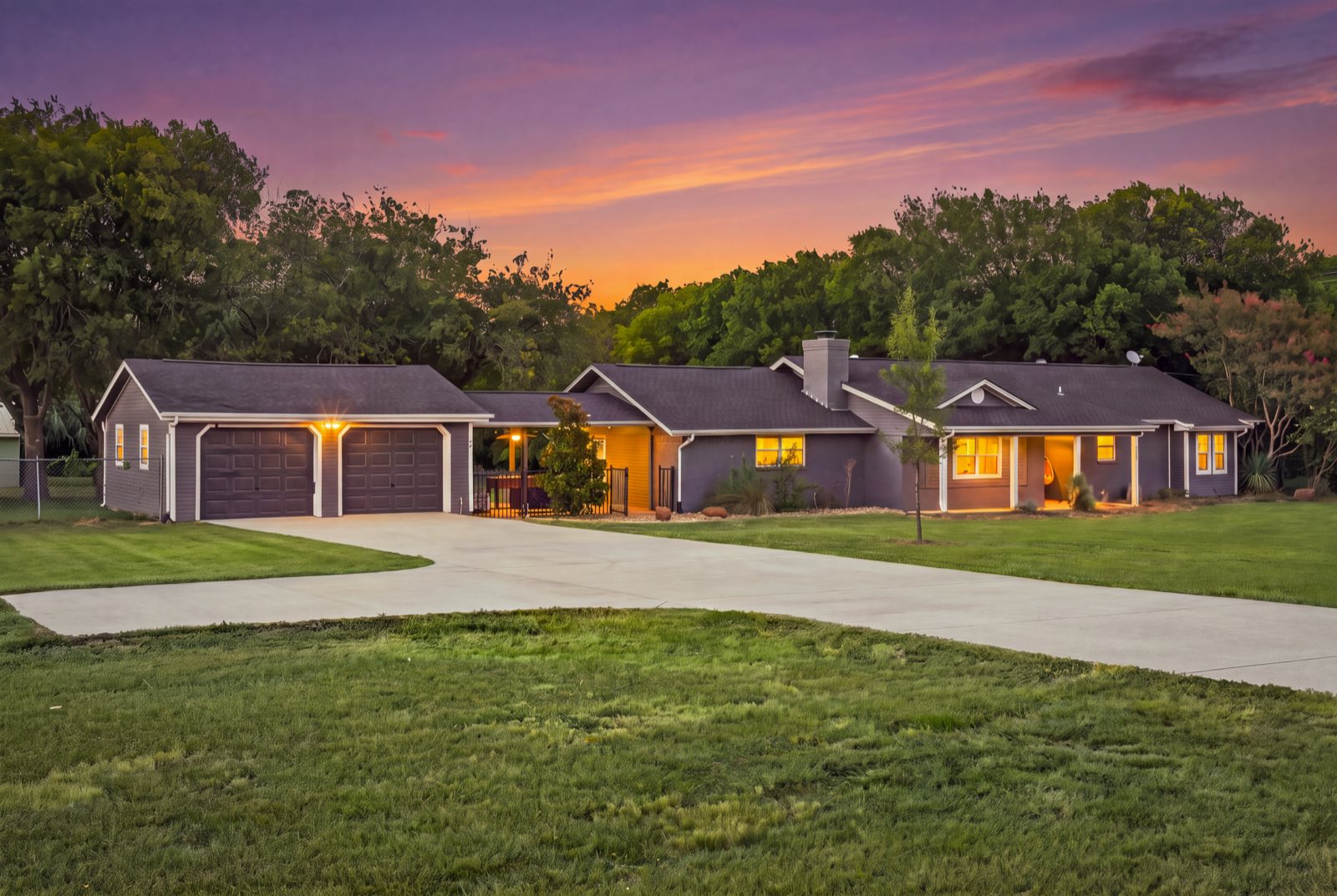Country home at twilight with a warm sunset sky, Ellis County