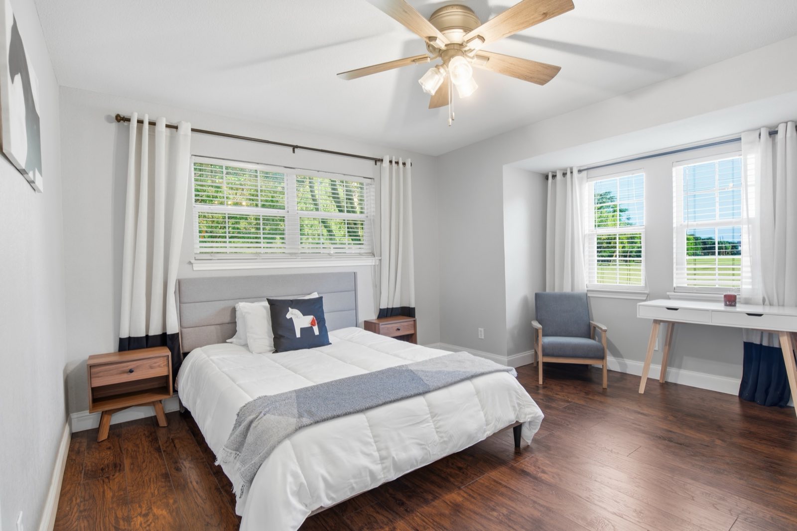 Primary bedroom suite, styled and naturally lit, Ellis County