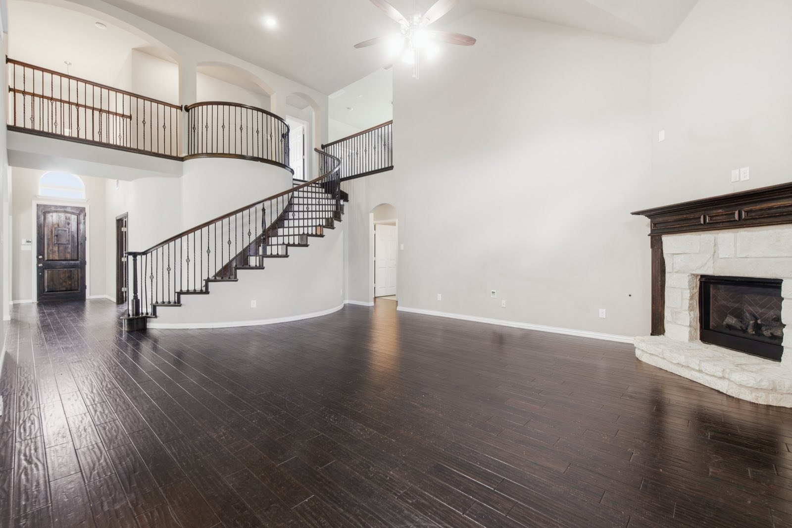 Living room with staircase and fireplace, Ellis County