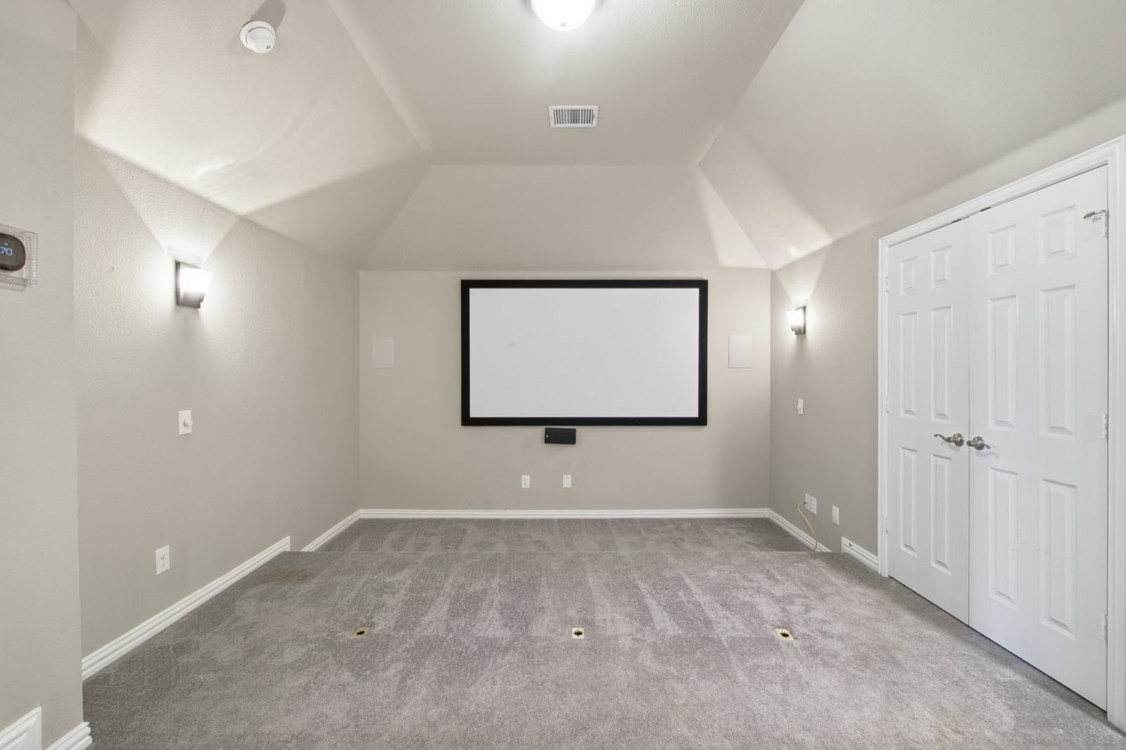 Media room with a projection screen, Ellis County